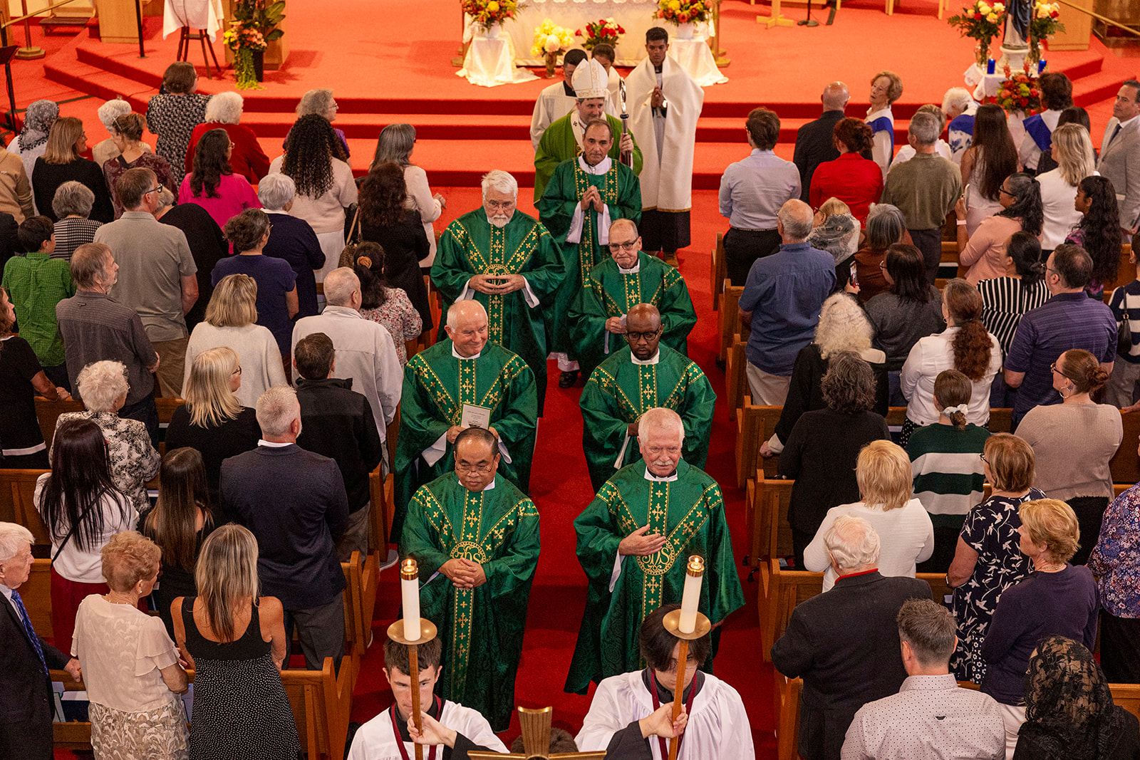 this image shows all the former priests celebrating mass with the Cardinal