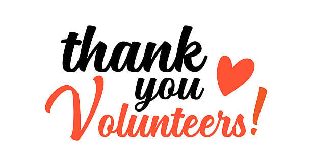 A text banner that states thank you volunteers in script.